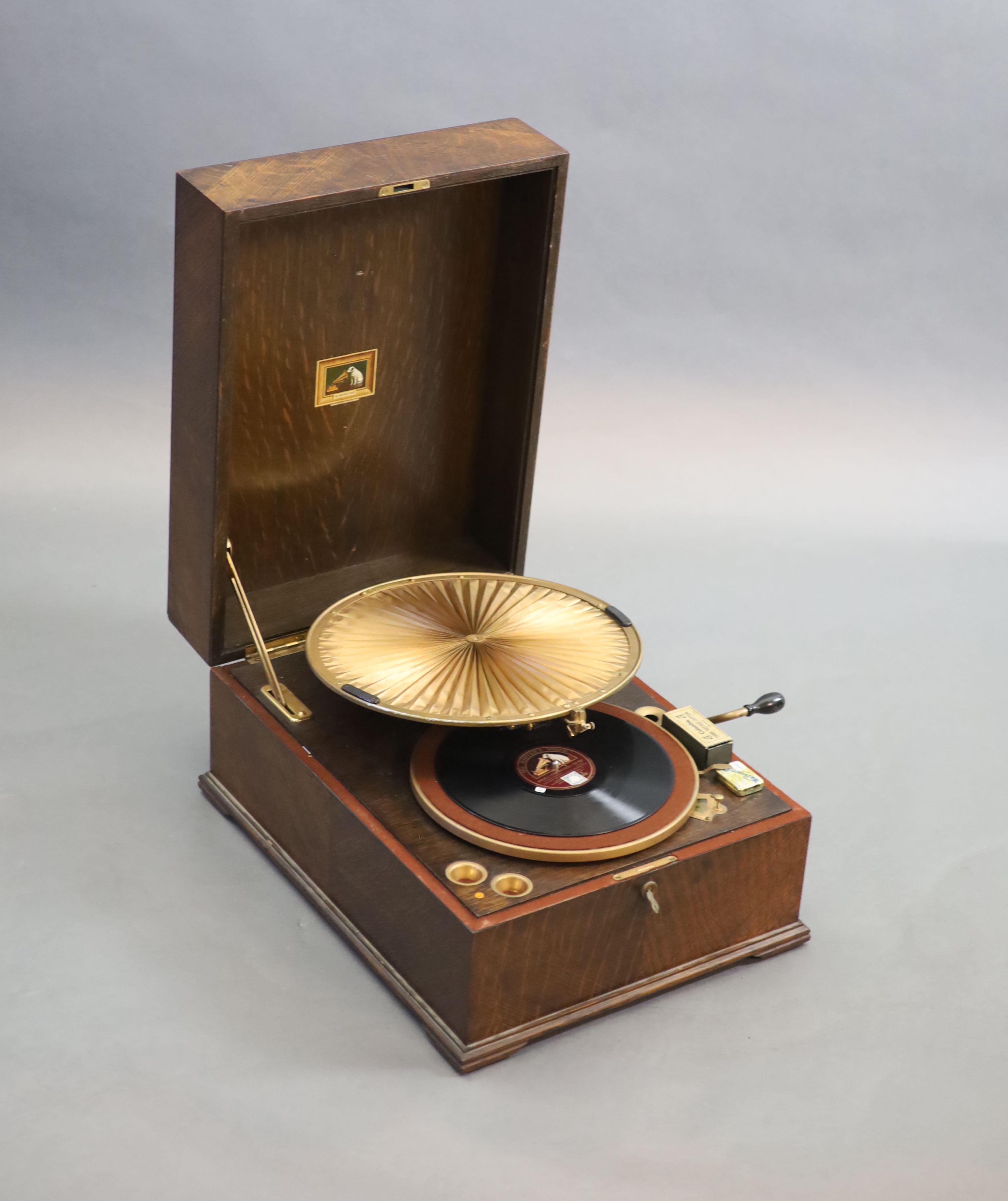 A HMV Lumiere model oak cased 460 gramophone, c1925, closed measurements 42cm wide, 55cm deep, 27cm high.
